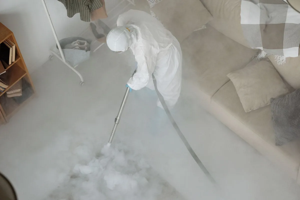 Biohazard cleanup technician in protective equipment, Gatewood, Seattle, WA